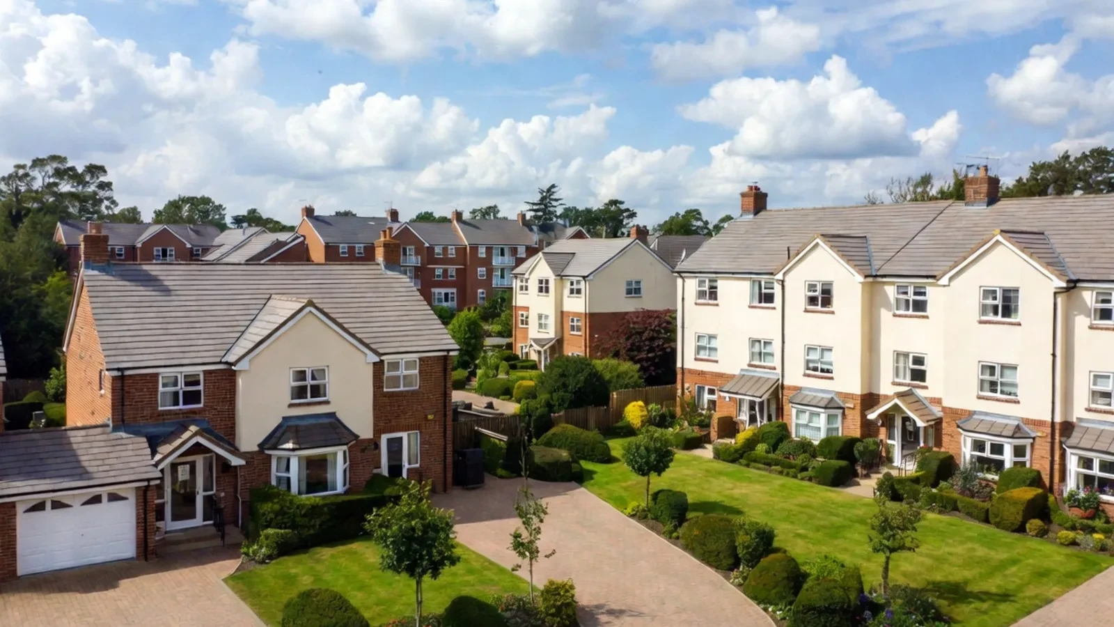 Aerial view of suburban houses with gardens