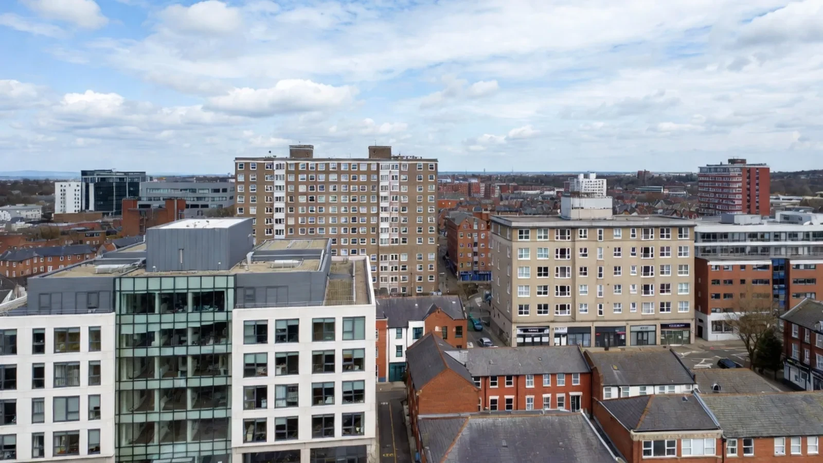 Aerial city view with mixed buildings
