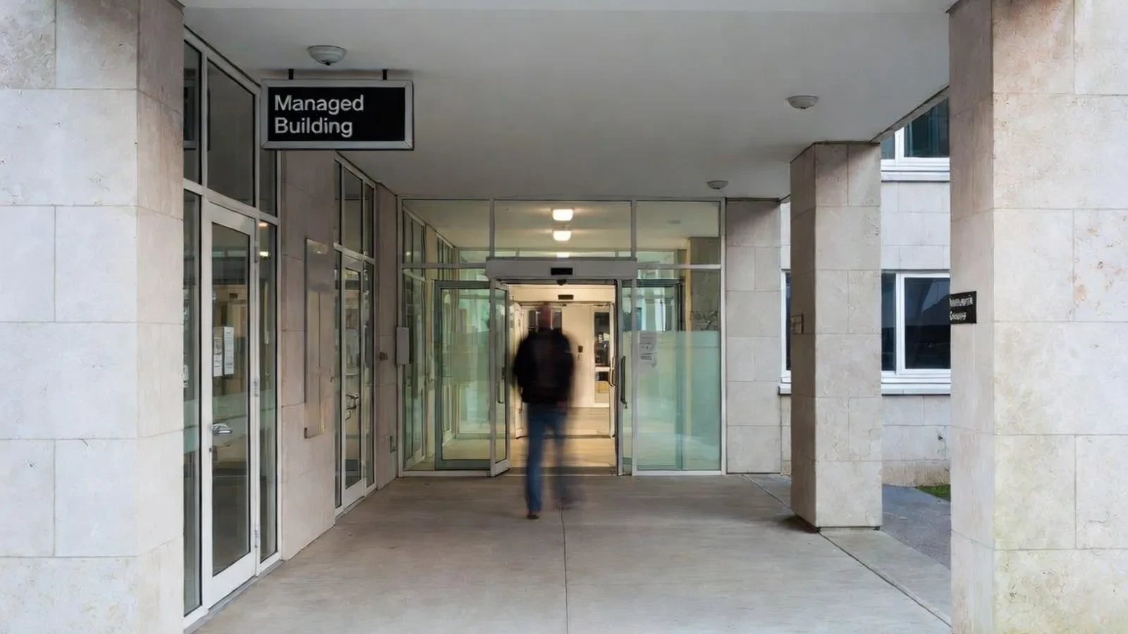 Entrance with Managed Building sign