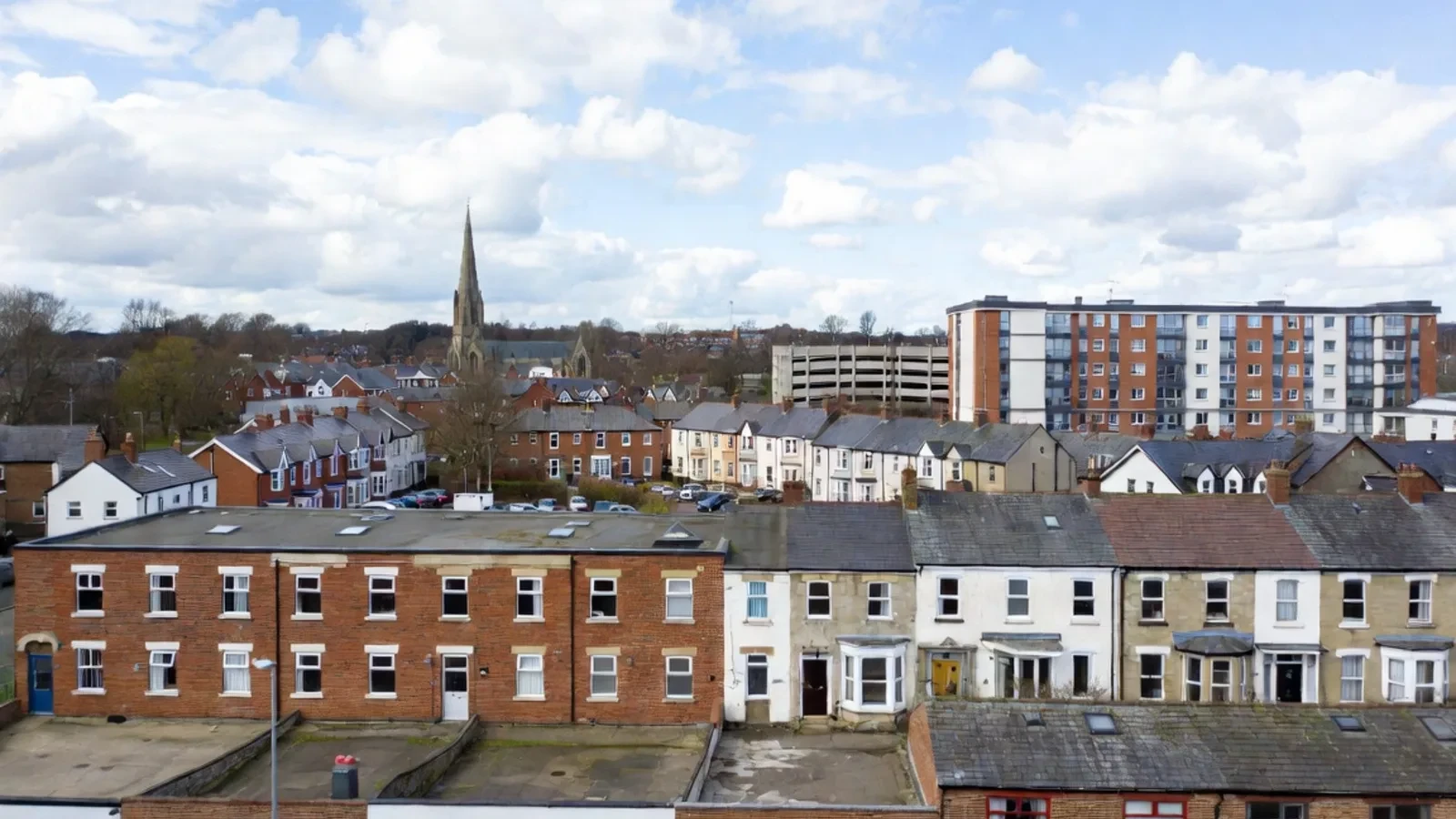 Townscape with church spire and terraced houses