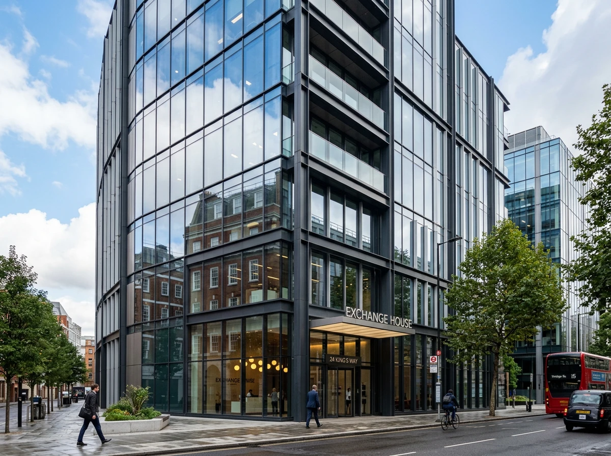 A modern commercial office building with reflective glass facade